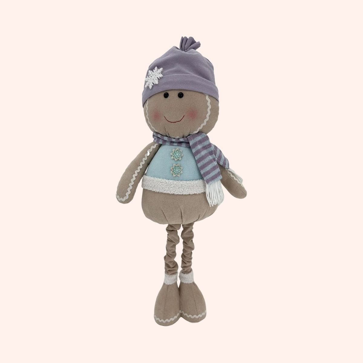 A plush winter-themed doll with a lavender knit hat, striped scarf, and light blue top, standing against a plain background.